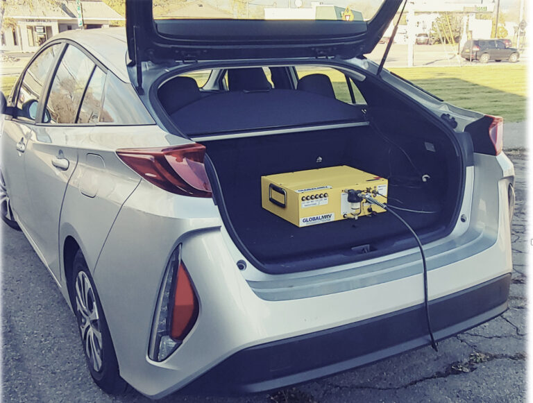 A Firefly PEMS unit in the back of a Toyota Prius car
