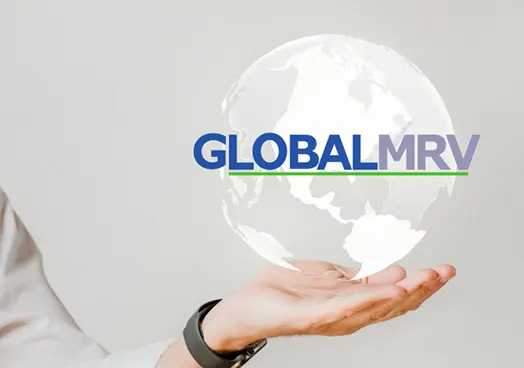 A picture of a hand holding up a globe with the words "GlobalMRV" across the globe